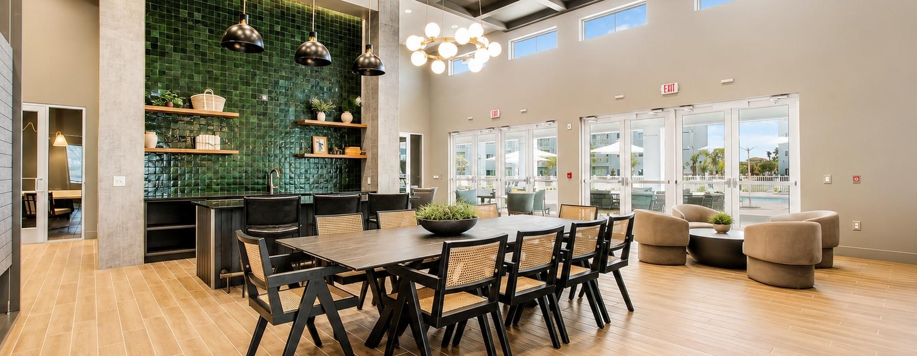 a large room with a table and chairs