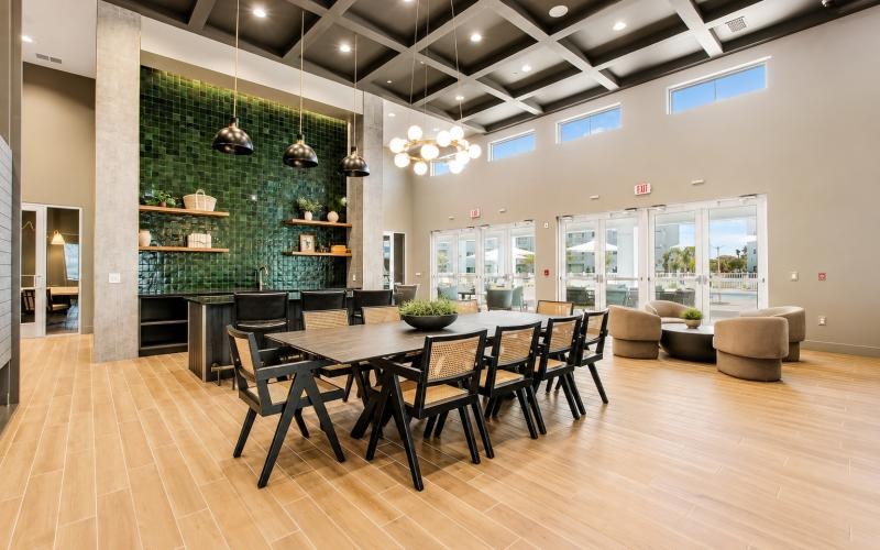 a large room with a table and chairs